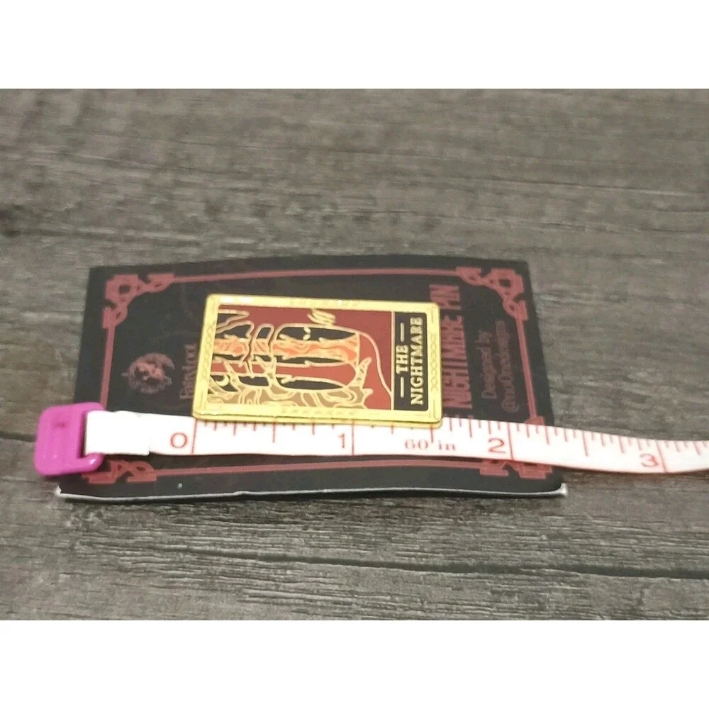Orbit Books nightmare pin